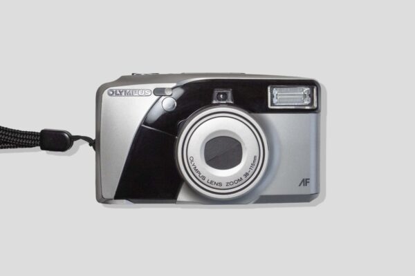 olympus superzoom 115, front image, point and shoot 35mm, vintage, retro, amazing 3x zoom camera, flash